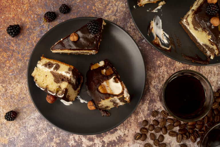 Decadent cheesecake brownies with creamy swirls and fudgy chocolate base.